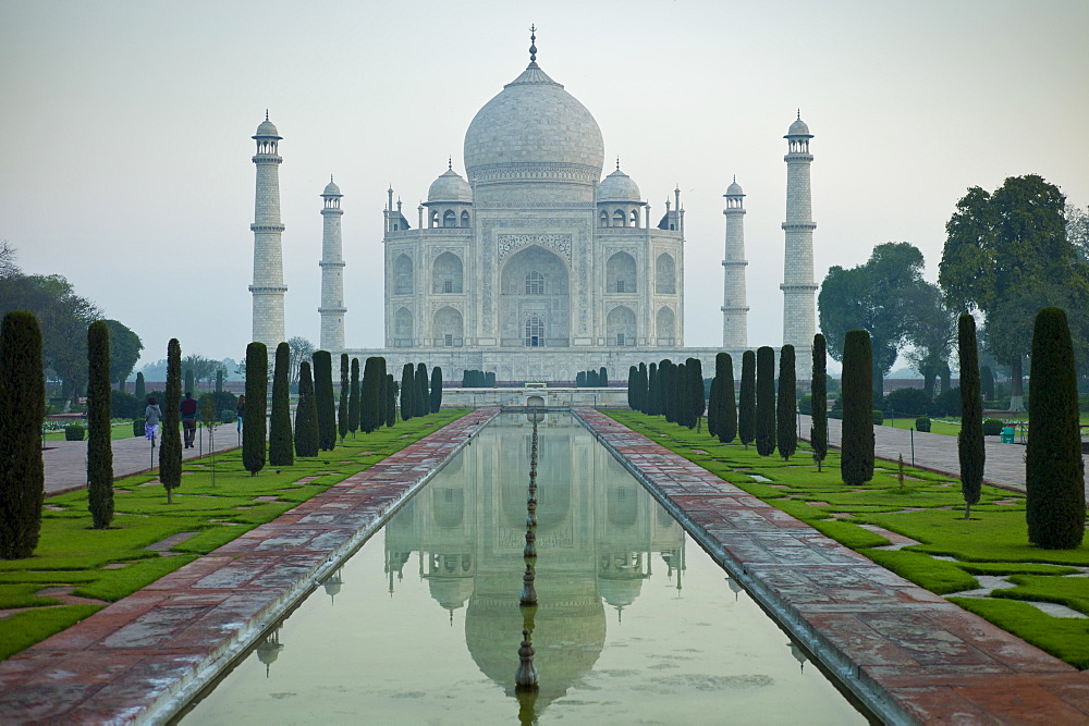 The Taj Mahal mausoleum southern view with reflecting pool and cypress trees, Uttar Pradesh, India