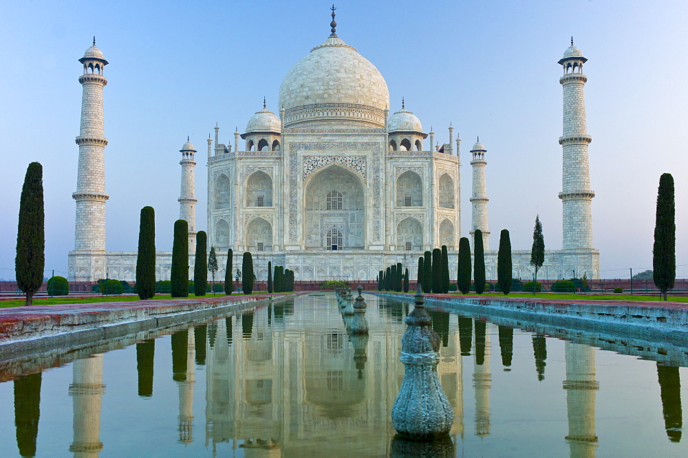 The Taj Mahal mausoleum southern view with reflecting pool and cypress trees, Uttar Pradesh, India