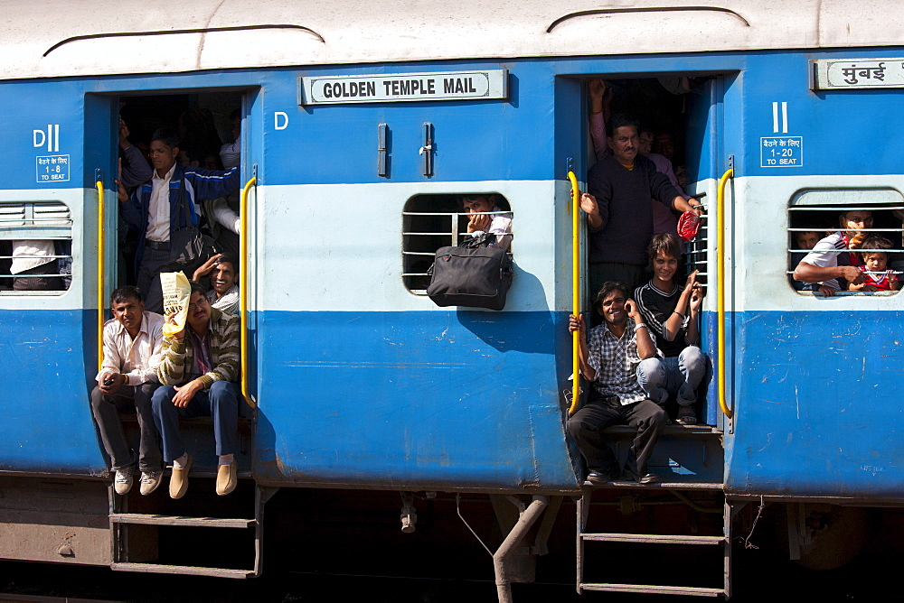 Indian people on crowded train at Bharatpur Station, Northern India