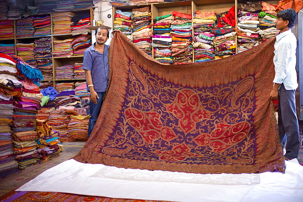 Shop selling cashmere and silk fabrics and textiles at Maharani Art Exports in Katala Bazar, Jodhpur Old Town, Rajasthan, India