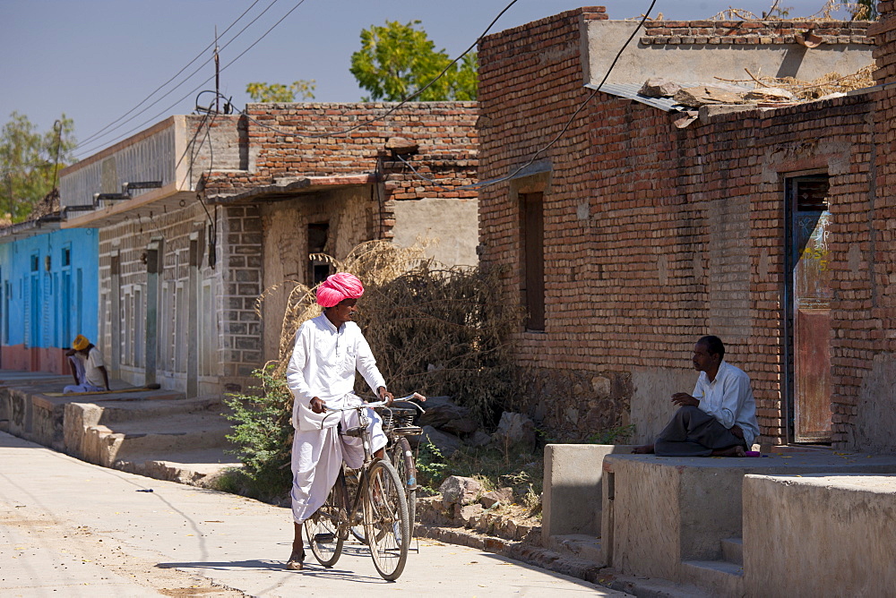 Indian men chatting at Jawali village in Rajasthan, Northern India