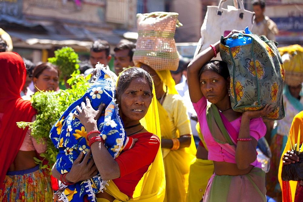 Indian women shopping in old town Udaipur, Rajasthan, Western India, Hindus and Muslims together.