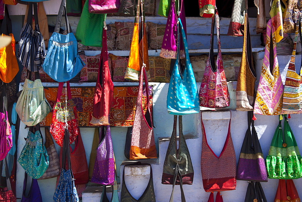 Woven fabric handbags on sale in street market in City Palace Road, Udaipur, Rajasthan, Western India