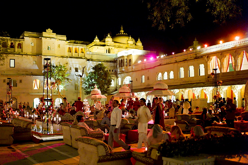 Banquet of 76th Maharana of Mewar, His Highness, Shriji Arvind Singh Mewar of Udaipur, at the City Palace to celebrate Hindu Holi Festival, Rajasthan, India. The party was in Laxmi Chowk courtyard of the Zenana Mahal (Queen's Palace)