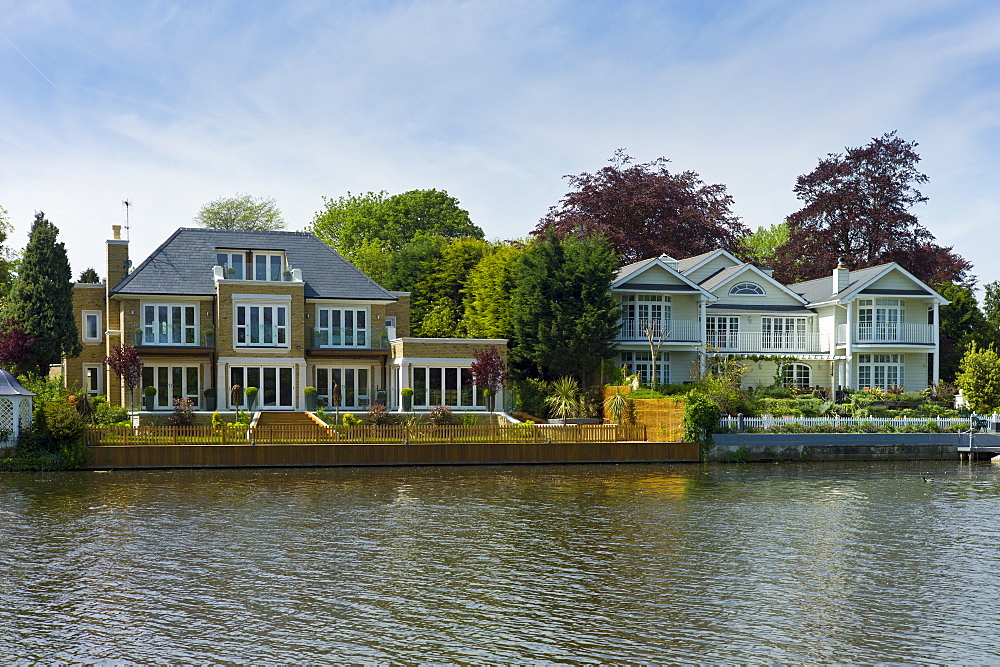 Luxury riverside houses on the banks of the River Thames in Berkshire,  UK