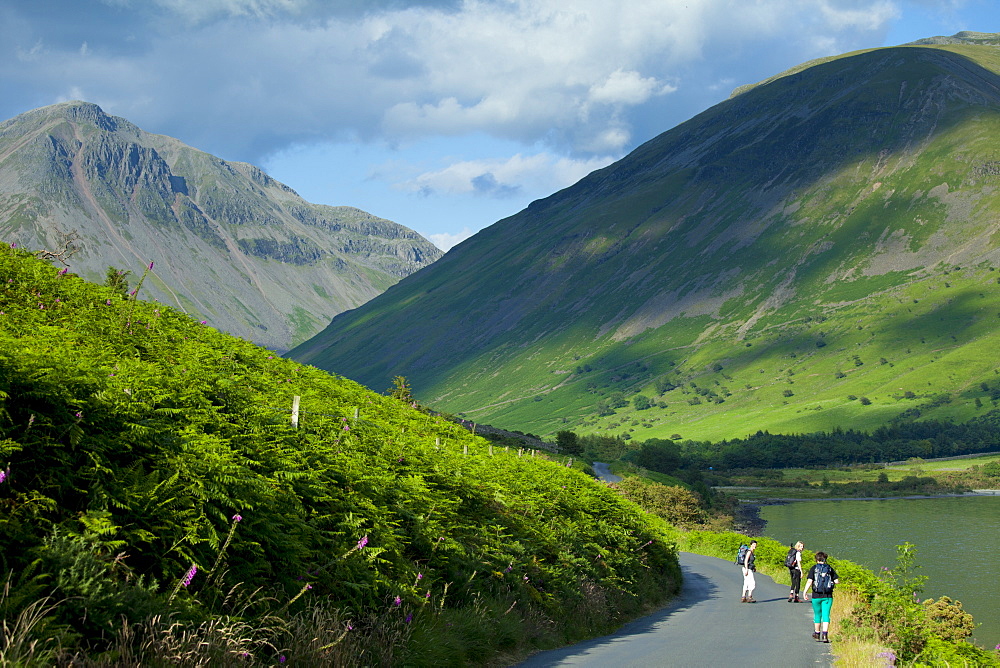 Tourists by Wasdale Fell and Wastwater in the Lake District National Park, Cumbria, UK