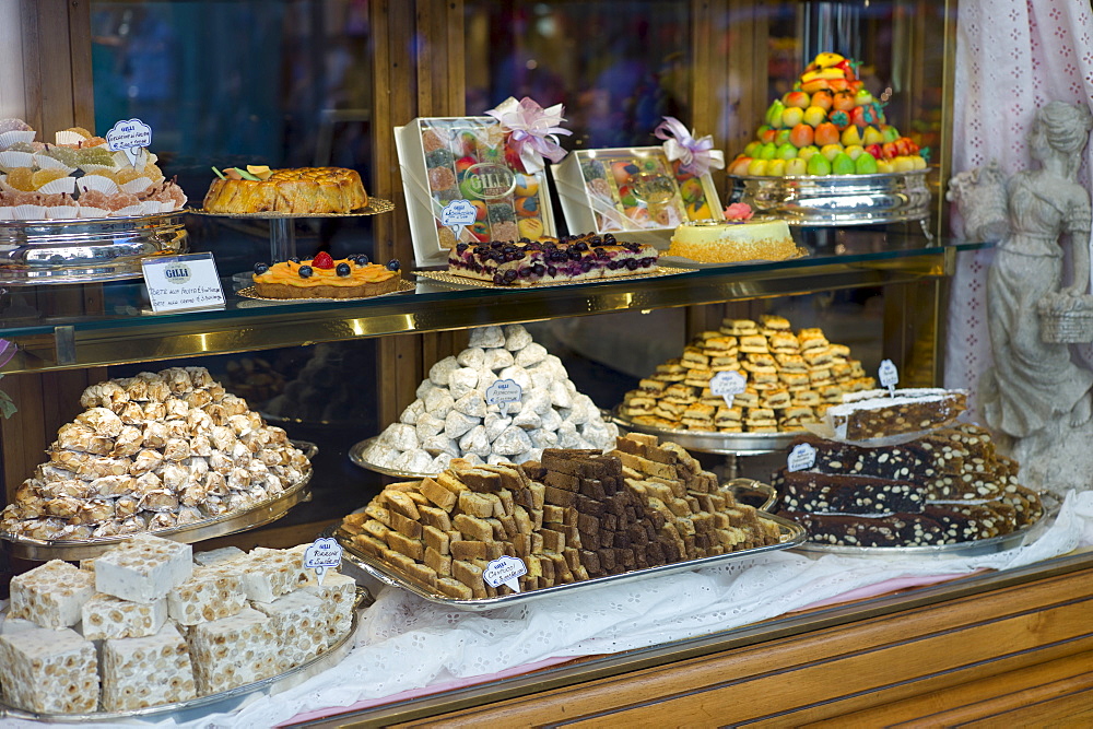 Cakes, sweets andpastries in shop window of luxury patticeria, caffe sweet shop Gilli, established in 1733 in Florence, Tuscany, Italy