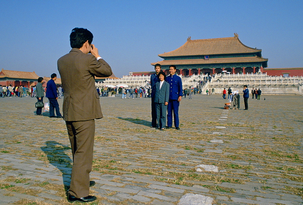 Tourists taking photographings in Forbidden City, Beijing, China