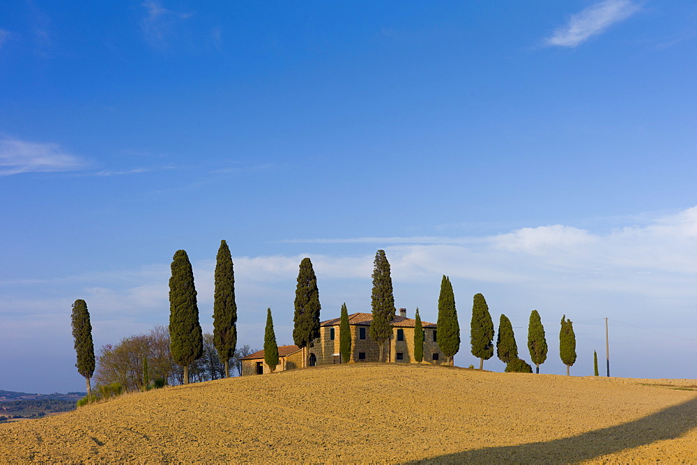 Typical Tuscan homestead, Il Cipressi, and landscape near Pienza in Val D'Orcia, Tuscany, Italy