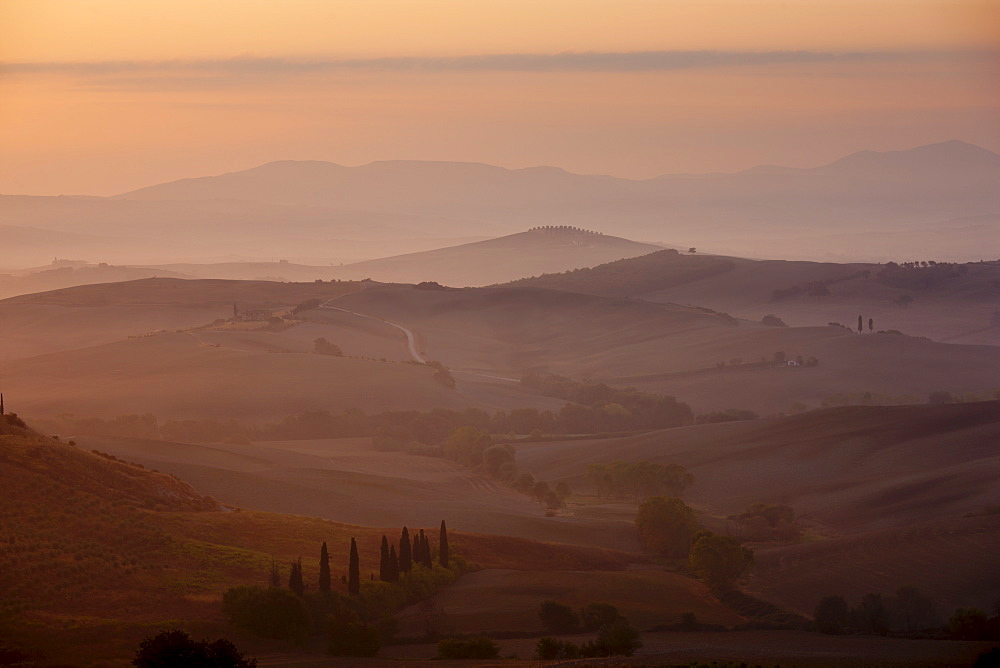 Tuscan landscape of hill slopes in Val D'Orcia, Tuscany, Italy