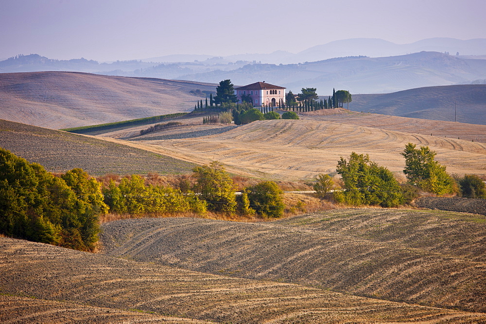 Typical Tuscan homestead and landscape near Montalcino, Val D'Orcia, Tuscany, Italy