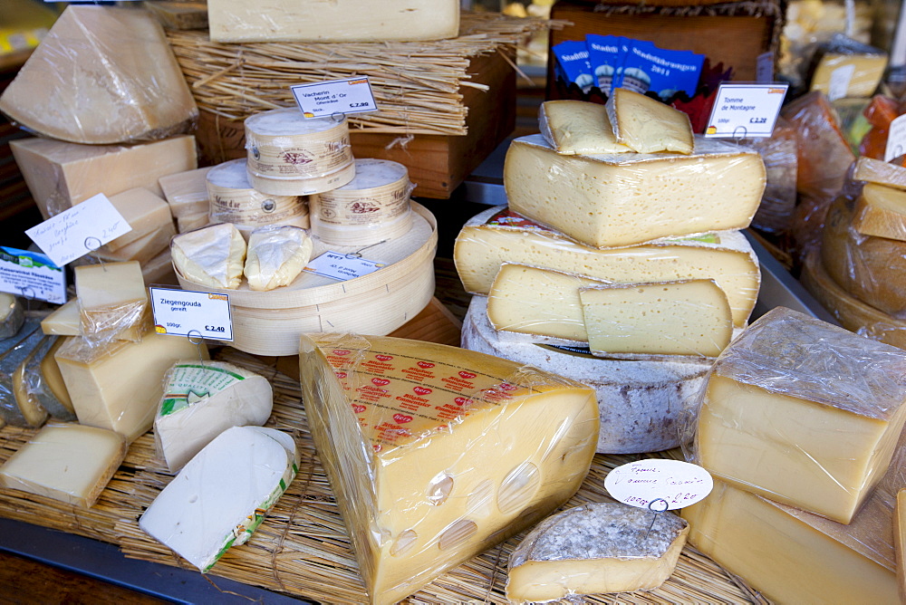 German artisan cheeses on sale at Viktualienmarkt food market in Munich, Bavaria, Germany