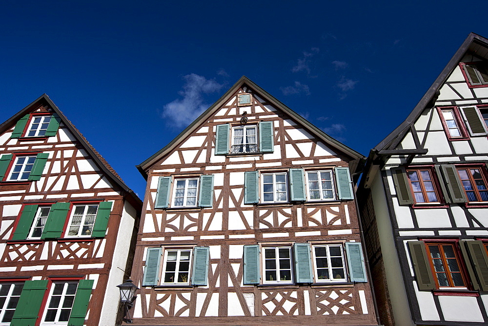 Windows and wooden shutters of quaint timber-framed houses in Schiltach in the Bavarian Alps, Germany