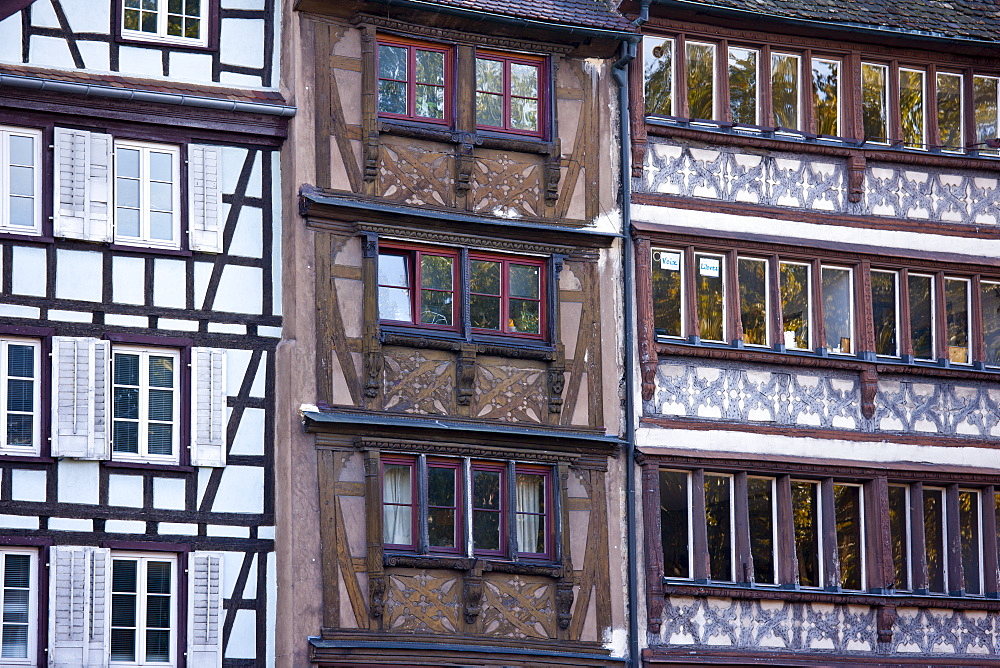 Traditional medieval architecture of canalside buildings along the Navigation Channel in the old part of Strasbourg, Alsace, France