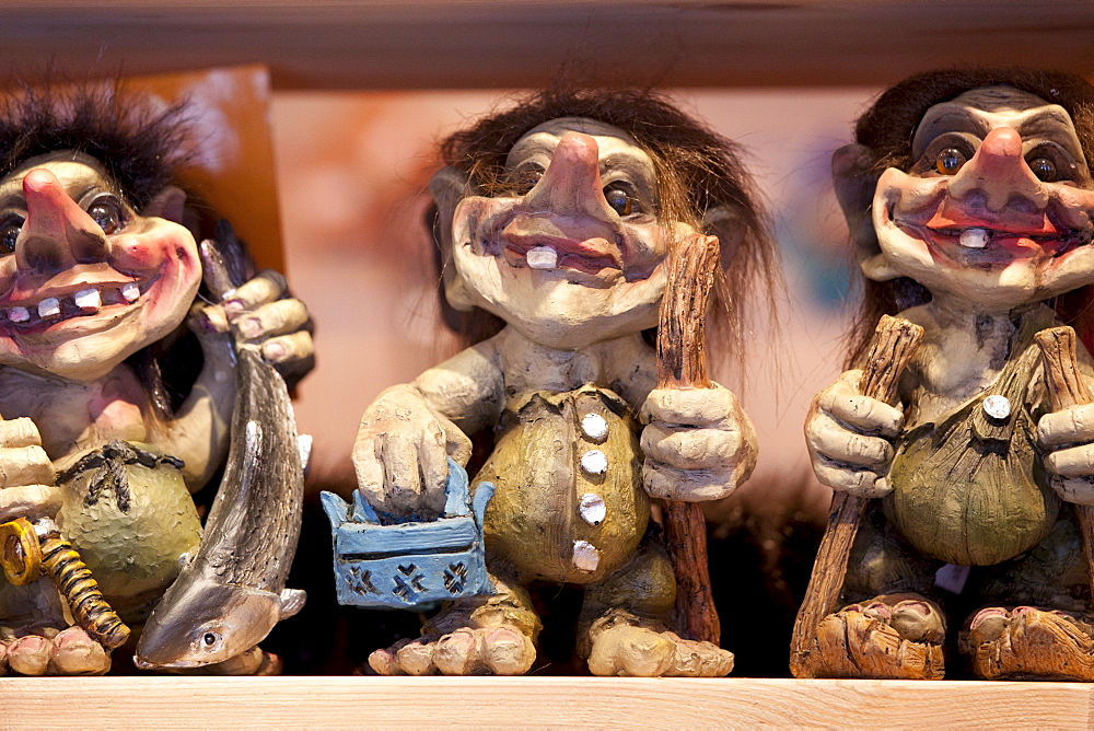 Traditional trolls on display in Tromso Gift and Souvenir Shop in Strandgata in Tromso, Norway