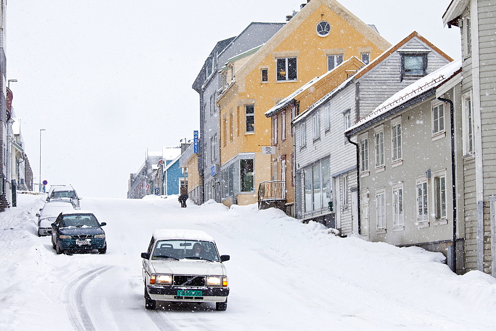 Volvo with winter tyres driving in snowy conditions in Tromso within the Arctic Circle in Northern Norway