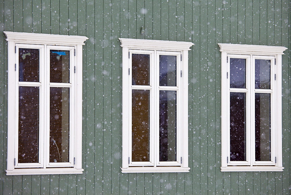 Traditional wooden buildings along Storgata in the quaint area of Tromso, in the Arctic Circle in Northern Norway