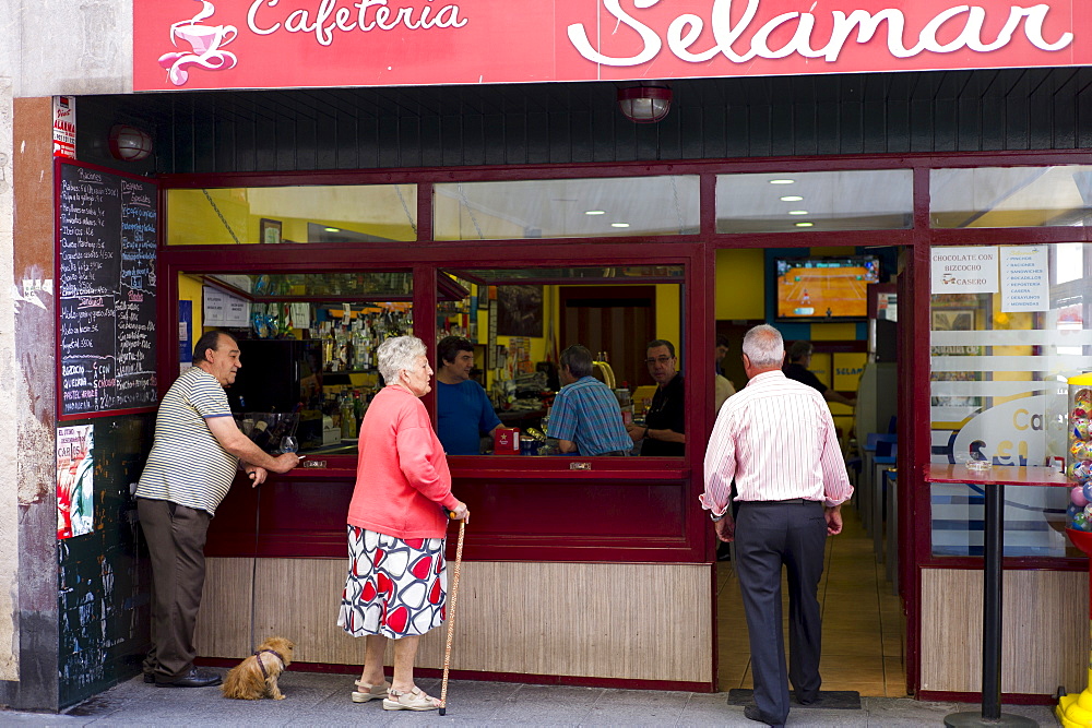 Local Spanish people at cafeteria in Laredo, Cantabria, Spain