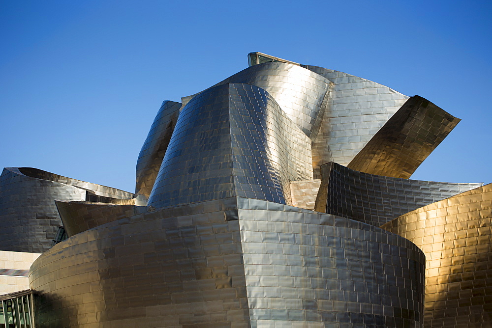 Architect Frank Gehry's Guggenheim Museum futuristic architectural design in titanium at Bilbao, Basque country, Spain