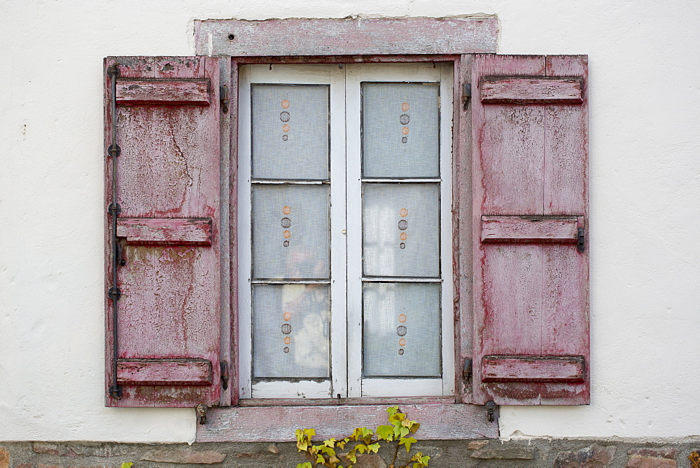 Typical Basque shuttered window in town of Oroz Betelu in Navarre, Northern Spain