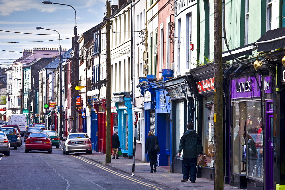 Brightly coloured shops in High Street in popular tourist town of Youghal, County Cork, Ireland