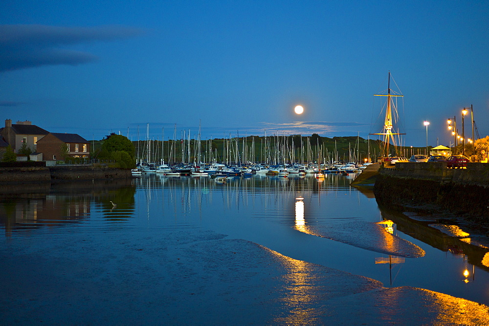 Popular tourist destination moonlit Kinsale harbour, in County Cork, Ireland