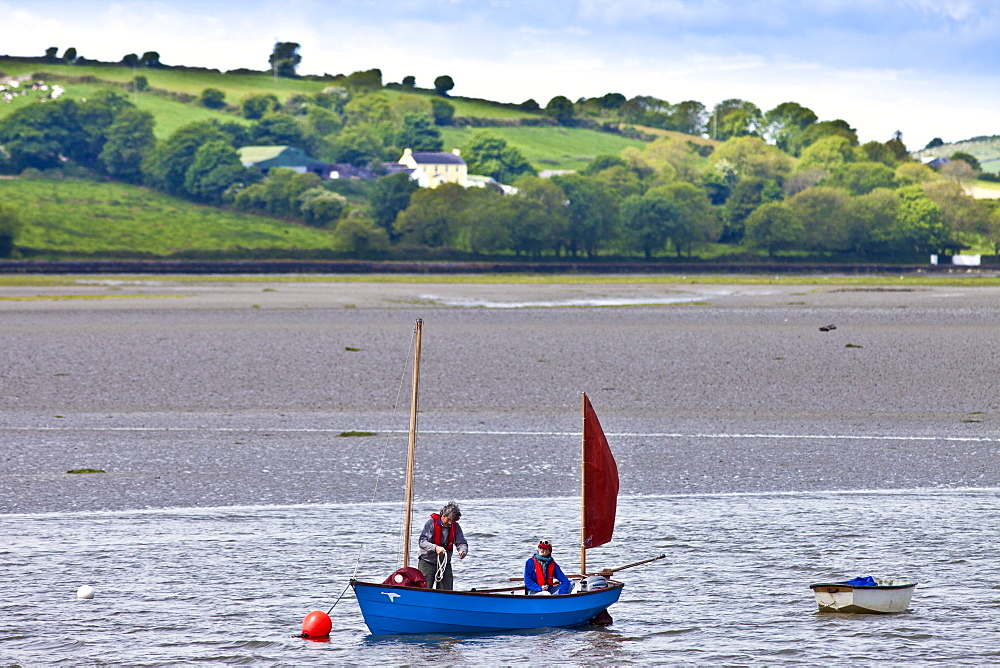 Fishermen on fishing boat in Courtmacsharry Bay, County Cork, Ireland