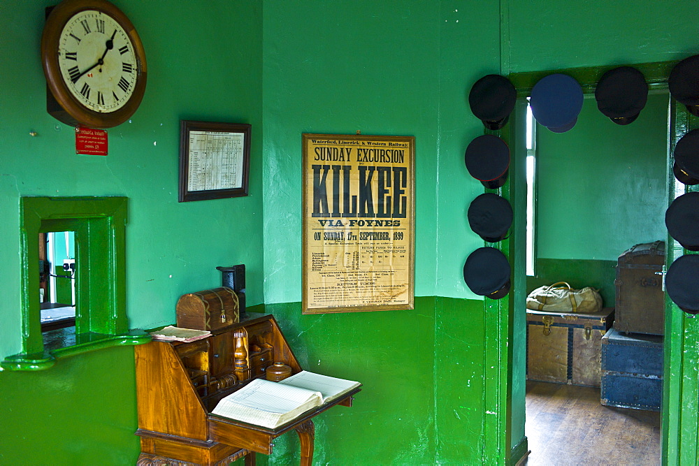 Restored booking hall in Moyasta station house with advertisement for Kilkee excursion, County Clare, West of Ireland