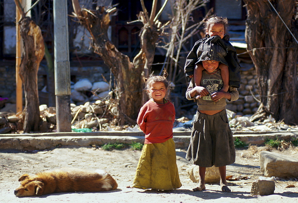 Children and a dog, Paro, Bhutan