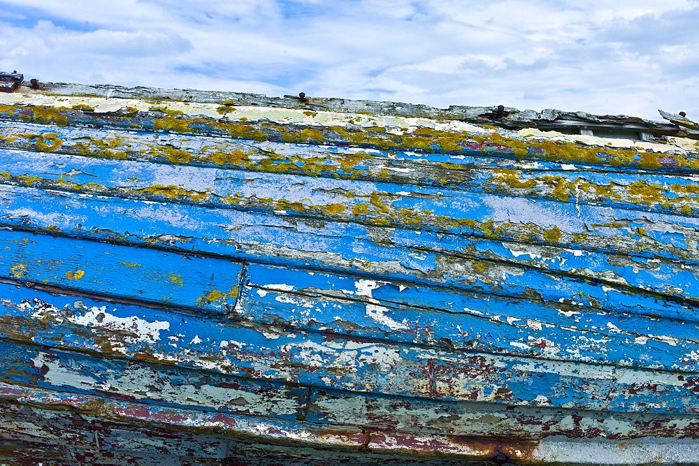 Faded aquamarine paint colour of a dilapidated fishing boat, County Clare, West Coast of Ireland