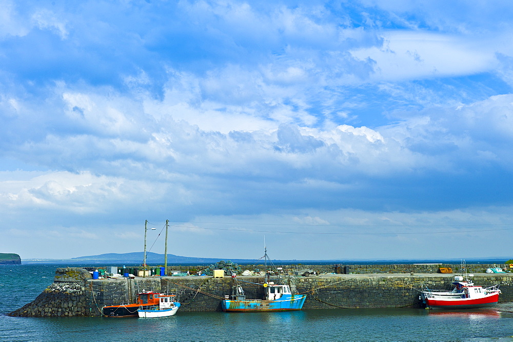 Fishing boats at Kilbaha quay harbour and bay, County Clare, West Coast of Ireland