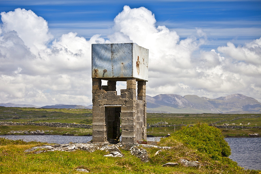 Primitive water tower in the Connemara landscape, County Galway