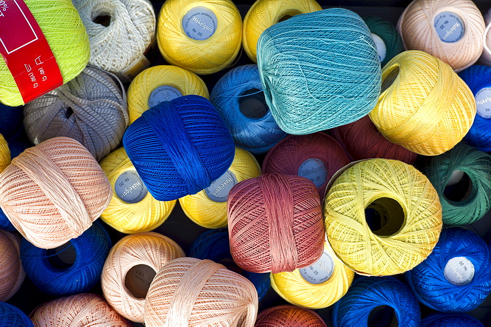 Cotton reels for crochet work on sale at street market in La Reole, Bordeaux region of France