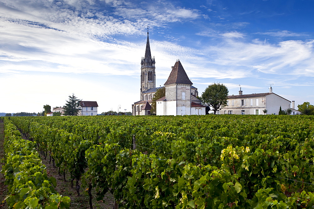 Village of Pomerol with vineyard, Chateau St Pierre and Church of St Jean in the Bordeaux wine region of France