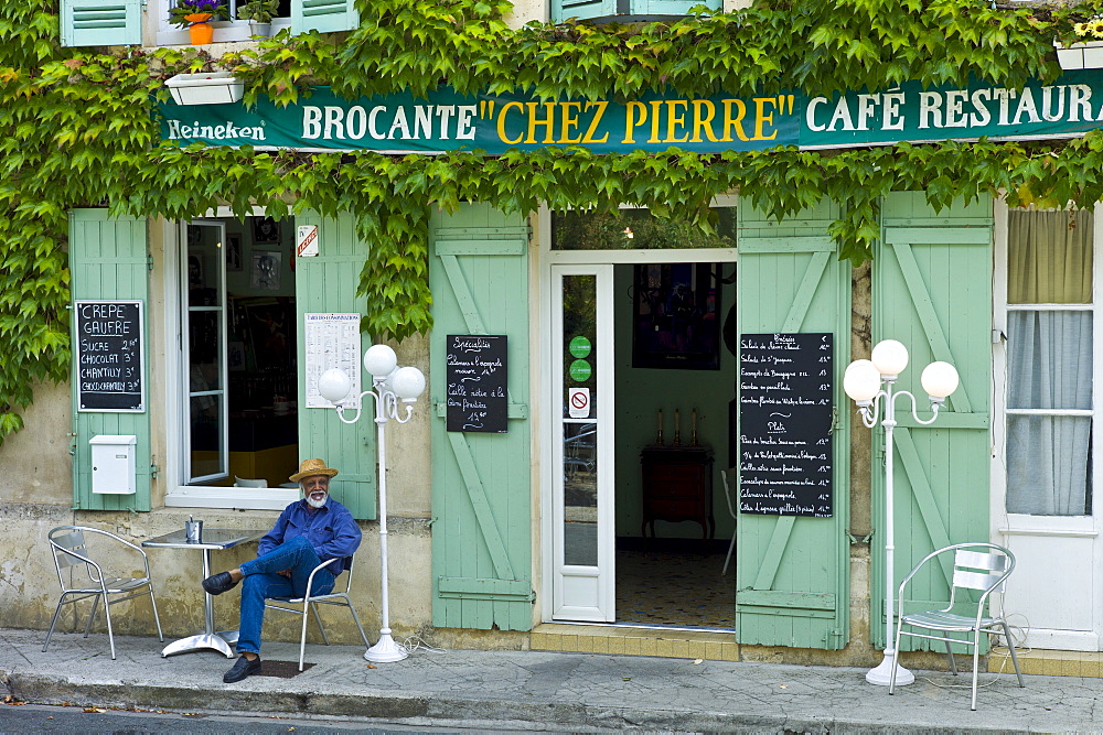 Traditional French Cafe Chez Pierre with menus in town of Castelmoron d'Albret in Bordeaux region, Gironde, France