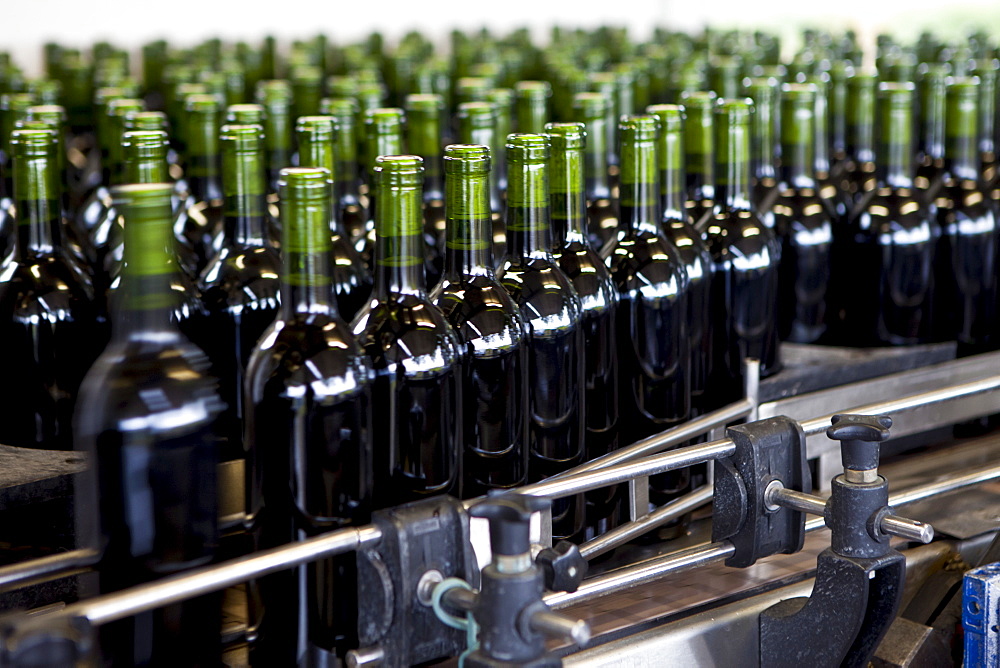 Wine bottling at the vineyard at Chateau Fontcaille Bellevue in the Bordeaux region of France