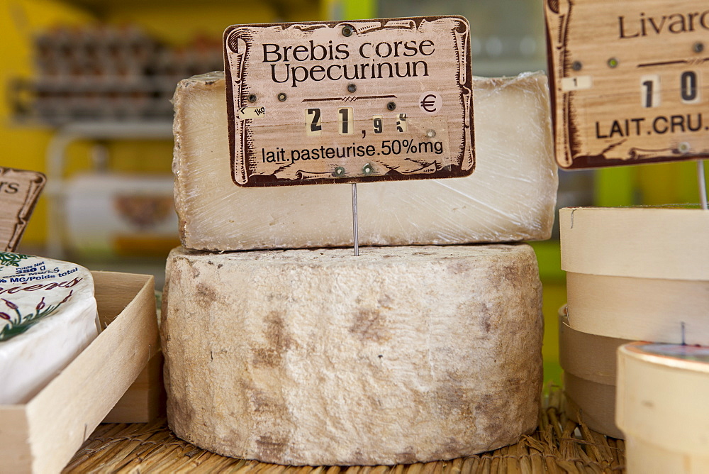 French cheeses on sale at food market at Sauveterre-de-Guyenne, Bordeaux, France