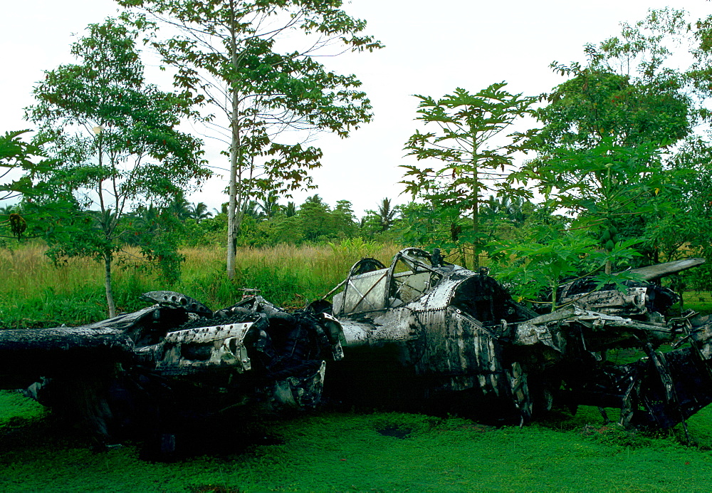 A wrecked World War II airplane abandoned in the Solomon Islands