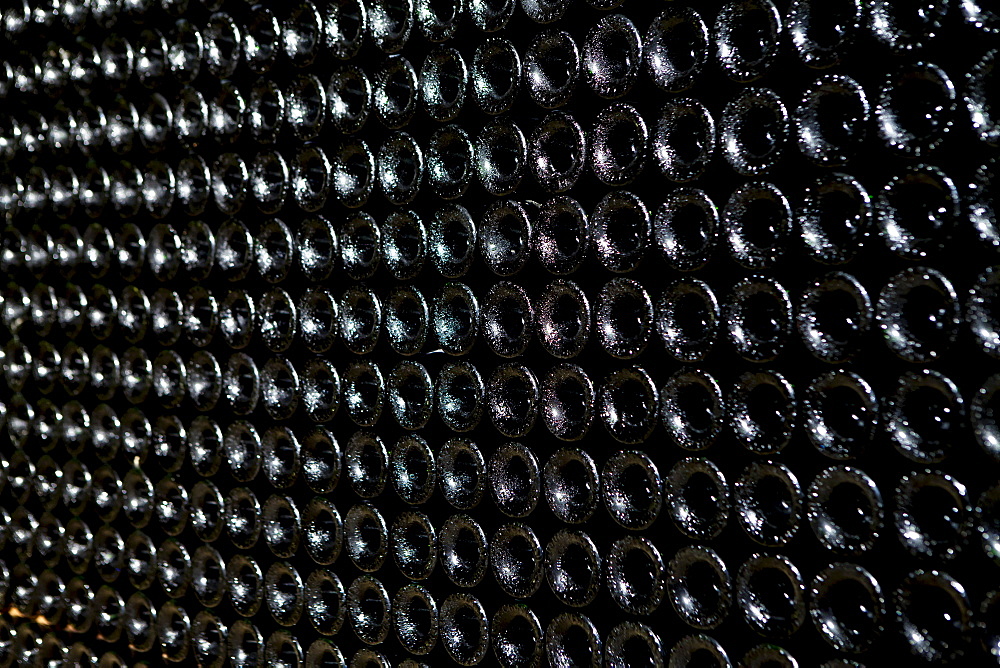 Vintage wine in underground cave at Chateau Beau-Sejour Becot at St Emilion in the Bordeaux wine region of France