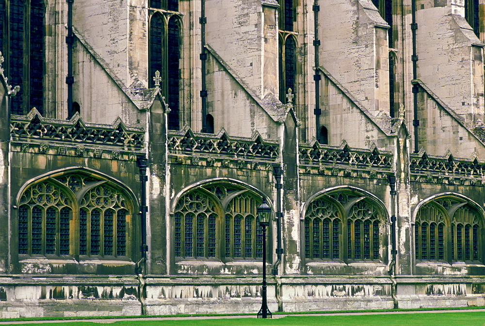 Side view of the walls and windows of Kings College Chapel in Cambridge, England, United Kingdom.