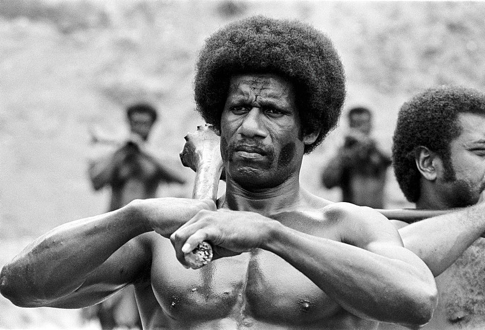 Fijian man taking part in traditional native kava ceremony at tribal gathering in Fiji, South Pacific