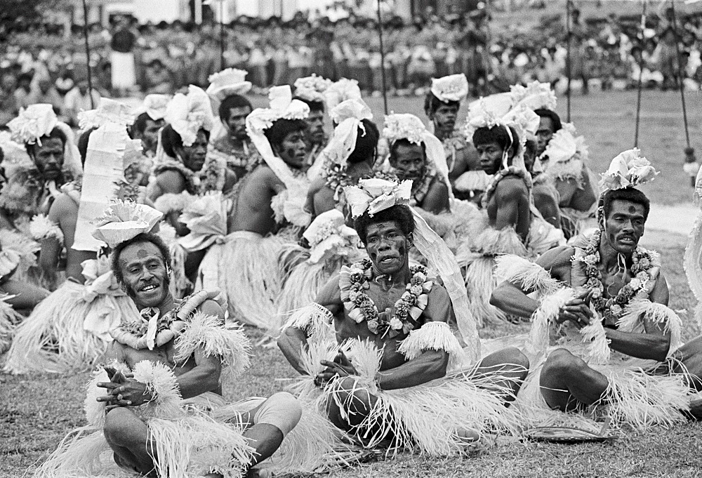 Locals attending traditional native kava ceremony at tribal gathering in Fiji, South Pacific