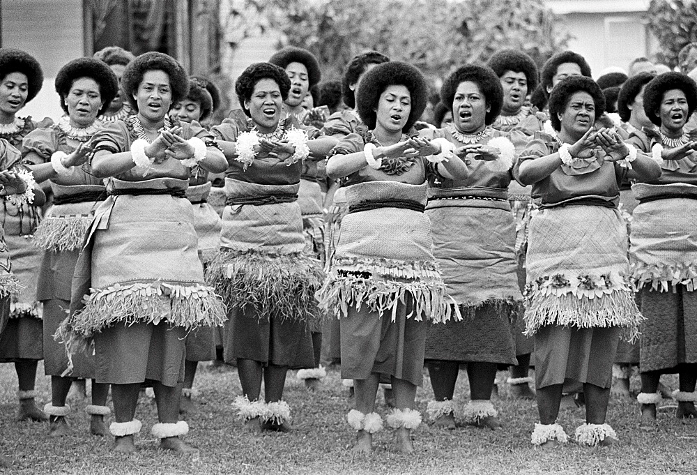 Local women dancing at traditional native kava ceremony at tribal gathering in Fiji, South Pacific