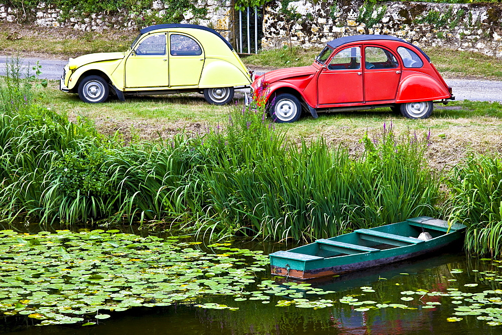 Traditional French Citroen Deux Chevaux 2CV cars at Angles Sur L'Anglin village, Vienne, near Poitiers, France