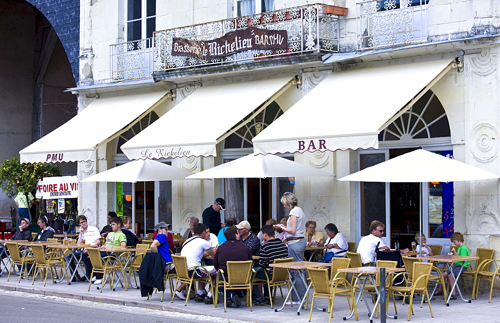 Diners at Le Richelieu Bar and Brasserie in Place du Marche in town of Richelieu, Loire Valley, Indre et Loire, France