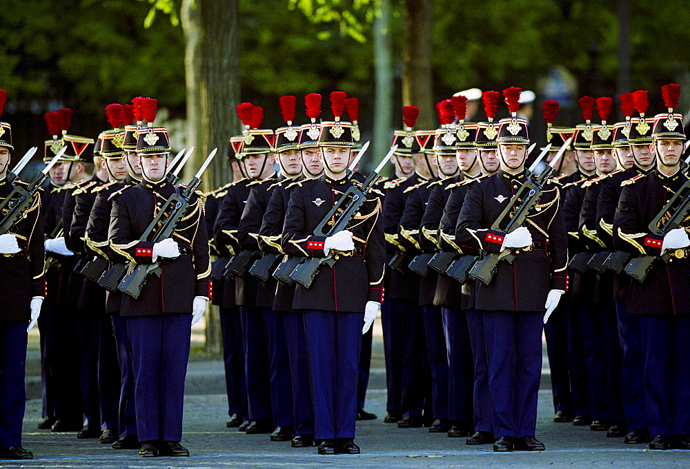 French soldiers with fixed bayonets in parade for Remembrance Day at the Arc de Triomphe in Paris, France