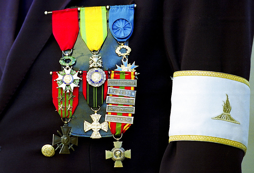 Veterans medals worn for parade for Remembrance Day at the Arc de Triomphe in Paris, France