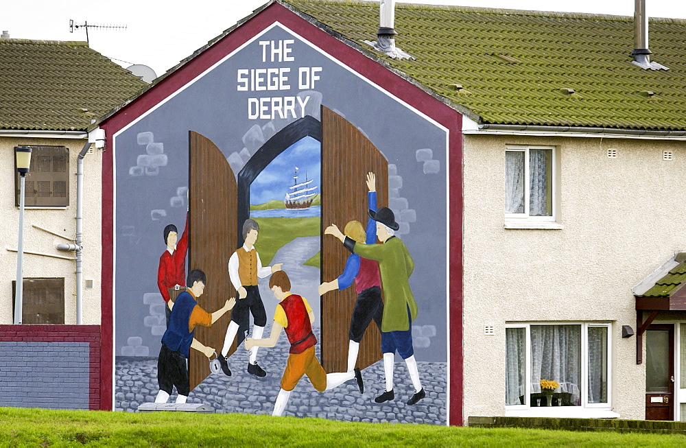 Protest mural depicts The Siege of Derry painted on house wall in Belfast, Northern Ireland