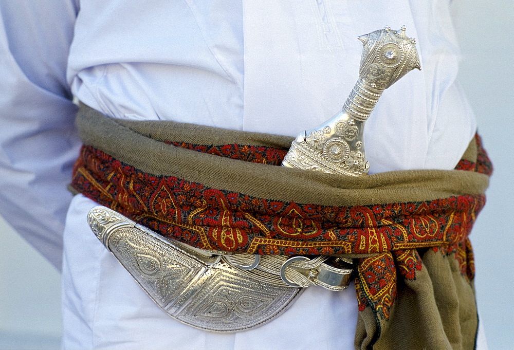 Omani man's khanjar dagger at cultural performance in Muscat in Oman, Middle East