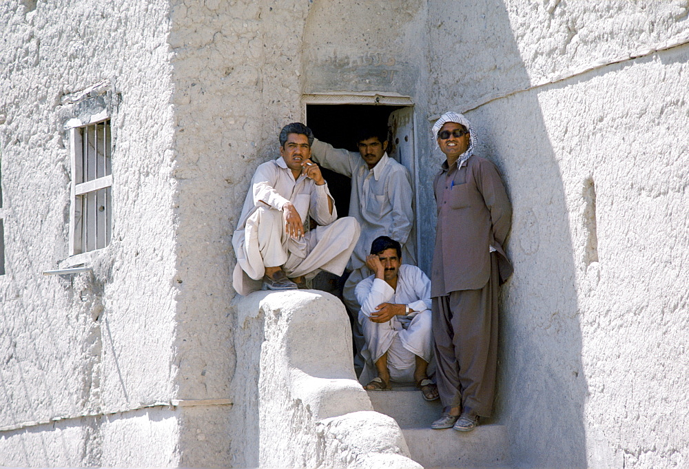 Young men in traditional clothing at Nizwa in Oman, Middle East